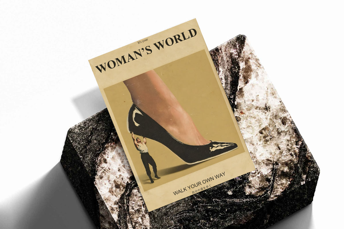 Unframed high-heel poster with mustard artwork and walking figure, on speckled fabric
