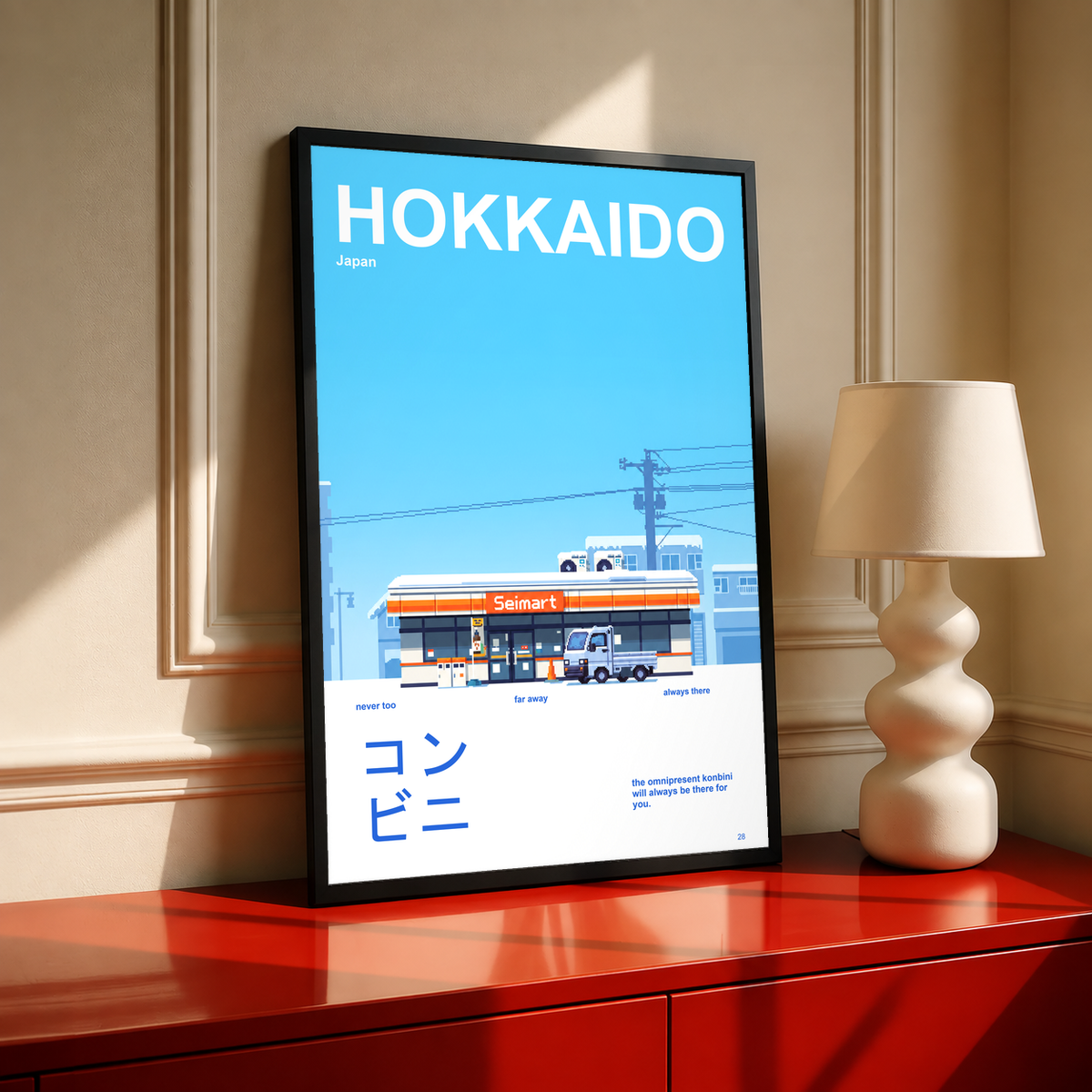 Black-framed HOKKAIDO poster with a snowy Seimart convenience store and small truck beneath a blue sky