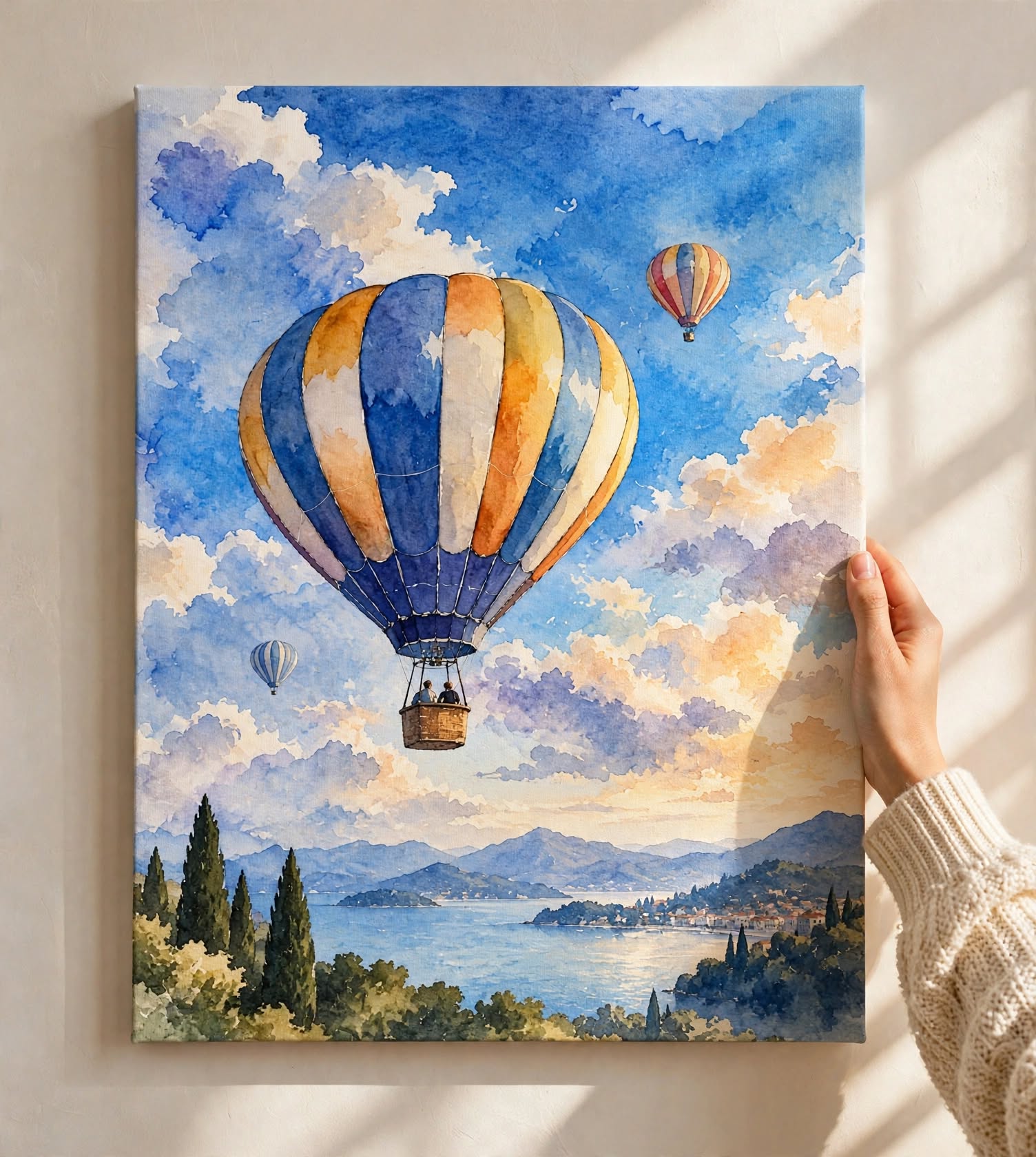 Hot Air Balloon Watercolor Art Print presented against a bright wall with expressive clouds and colorful watercolor textures