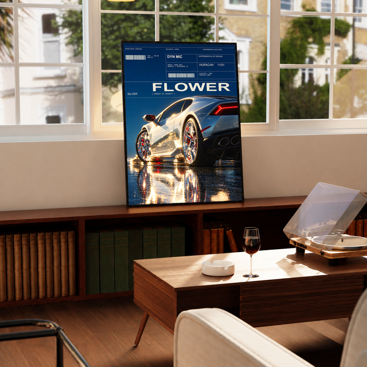 Silver Huracan with flowers around the rear wheel and night reflections; framed print beside a window