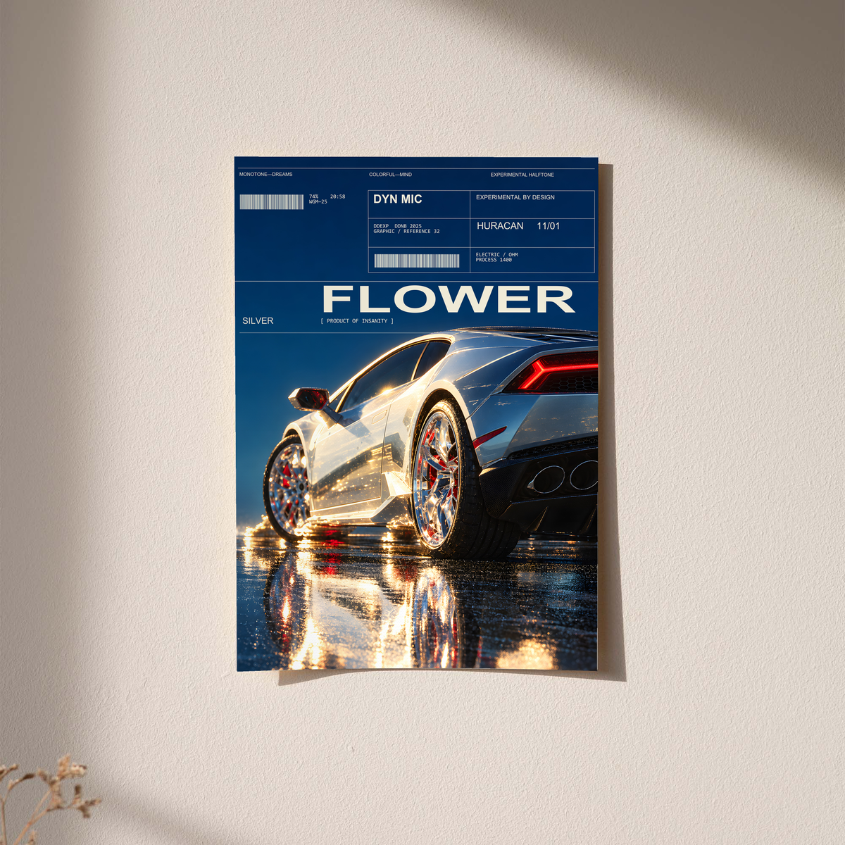 Silver Huracan with flowers around the rear wheel and night reflections; unframed print on a wall