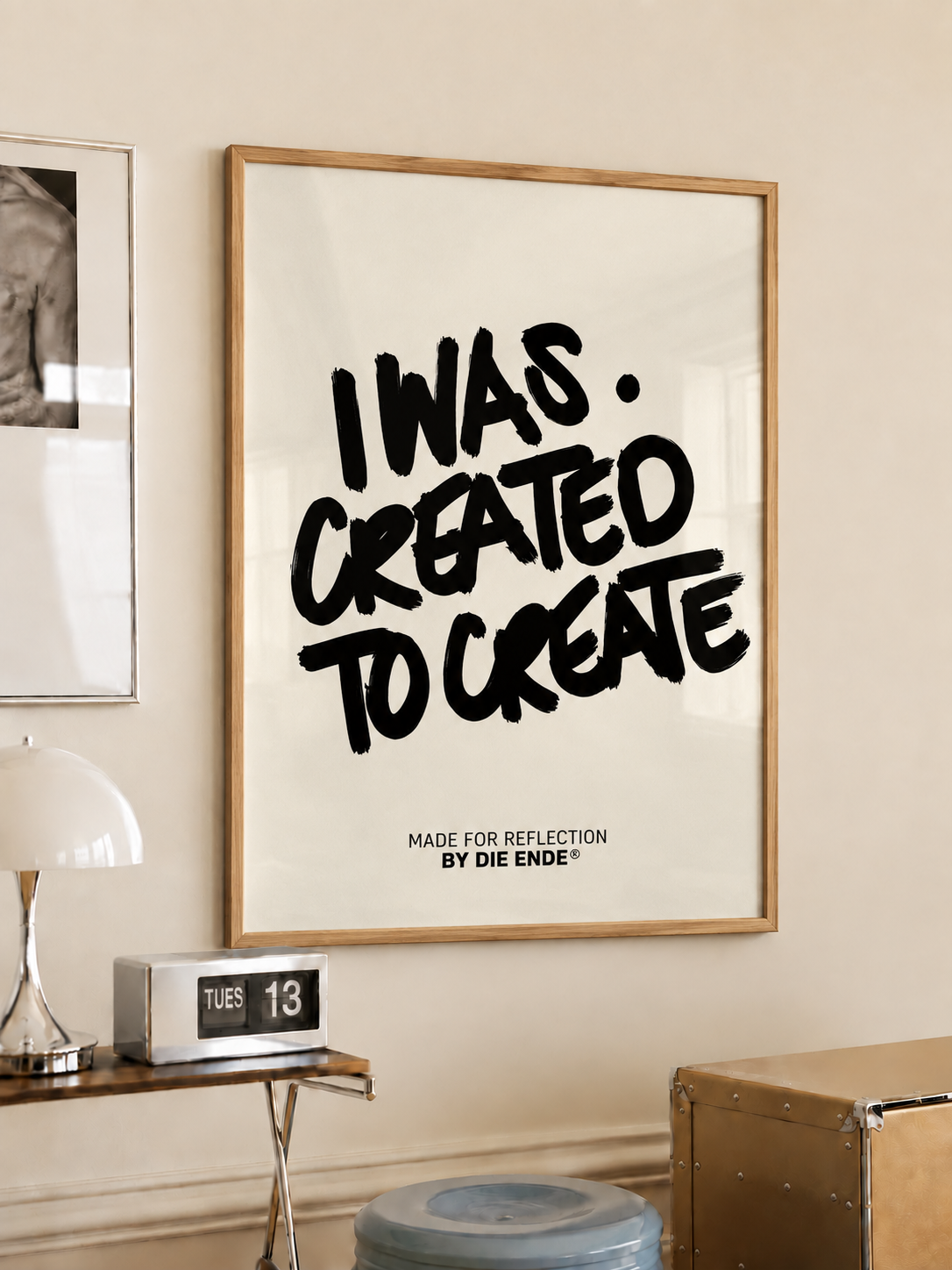 Wooden-framed typography wall art poster with black brush text on white background