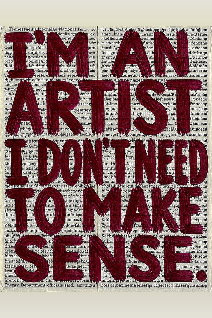 Newsprint quote poster close-up with burgundy brush lettering: I’M AN ARTIST, I DON'T NEED