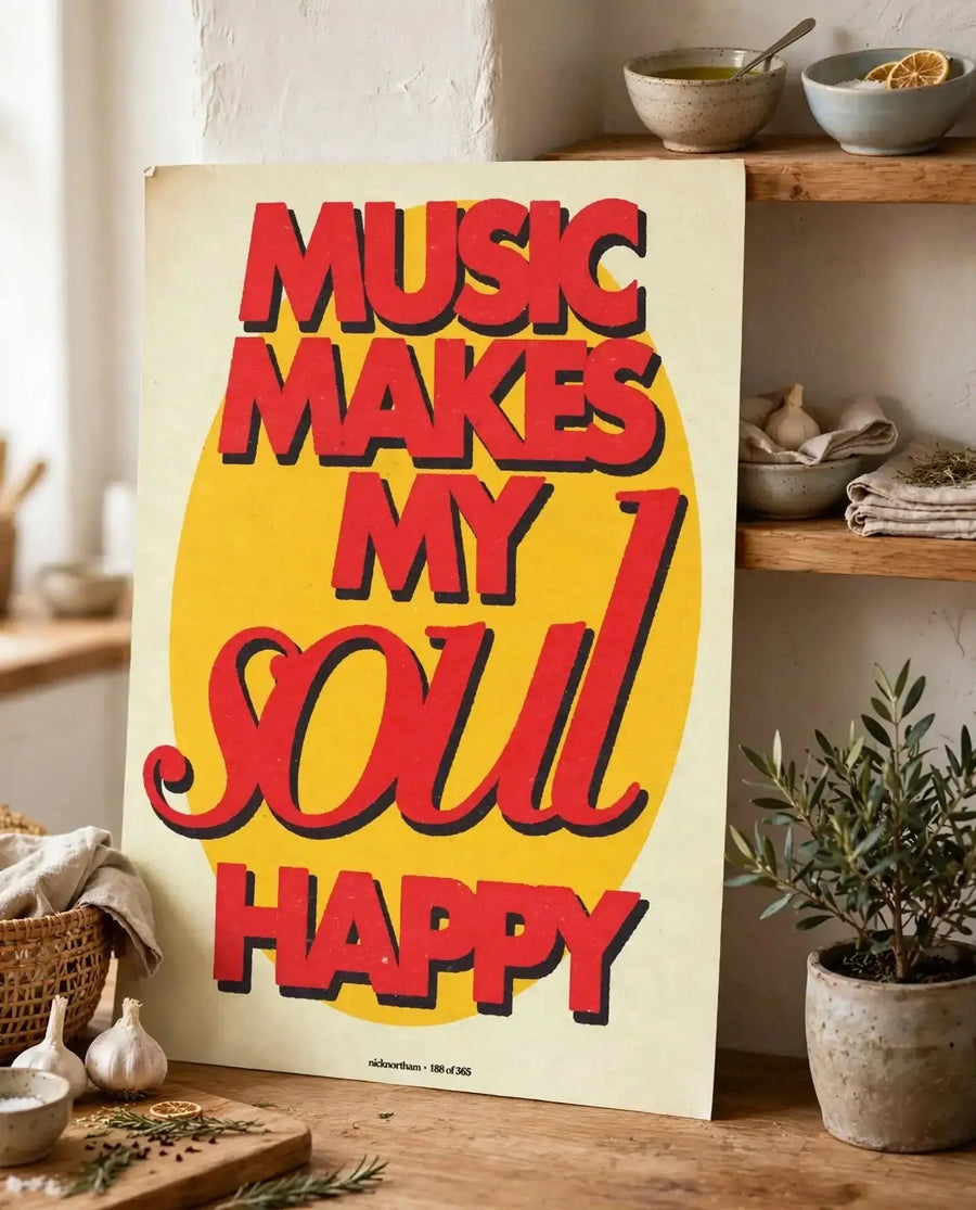 Unframed music quote print with yellow background and red 'Music makes my soul happy' text.