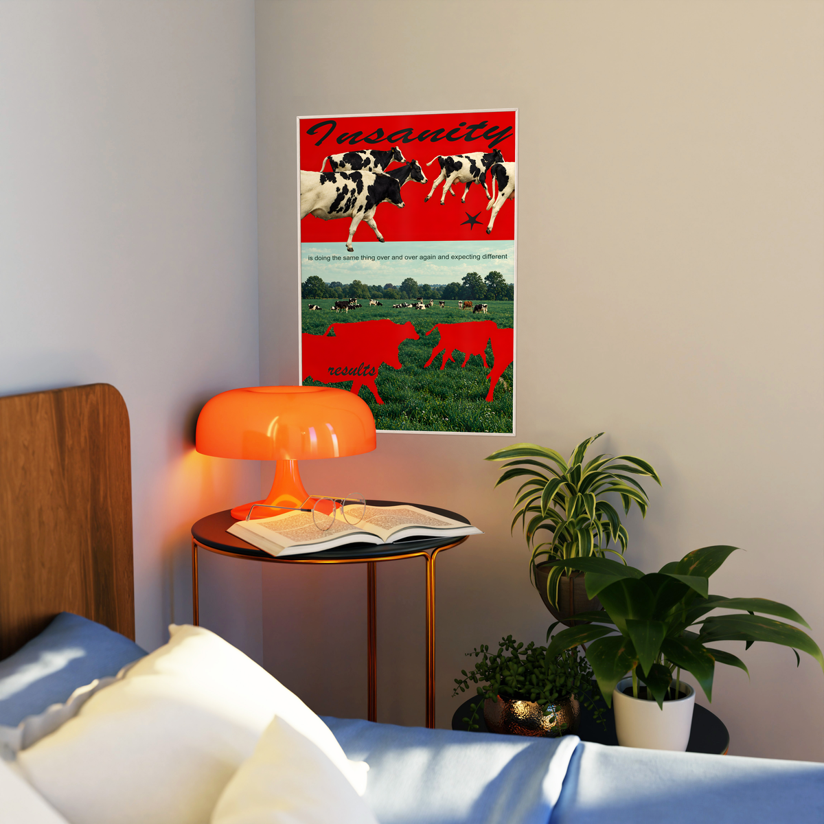 Red cow silhouettes and black and white cattle above a green pasture; artwork styled in a living room