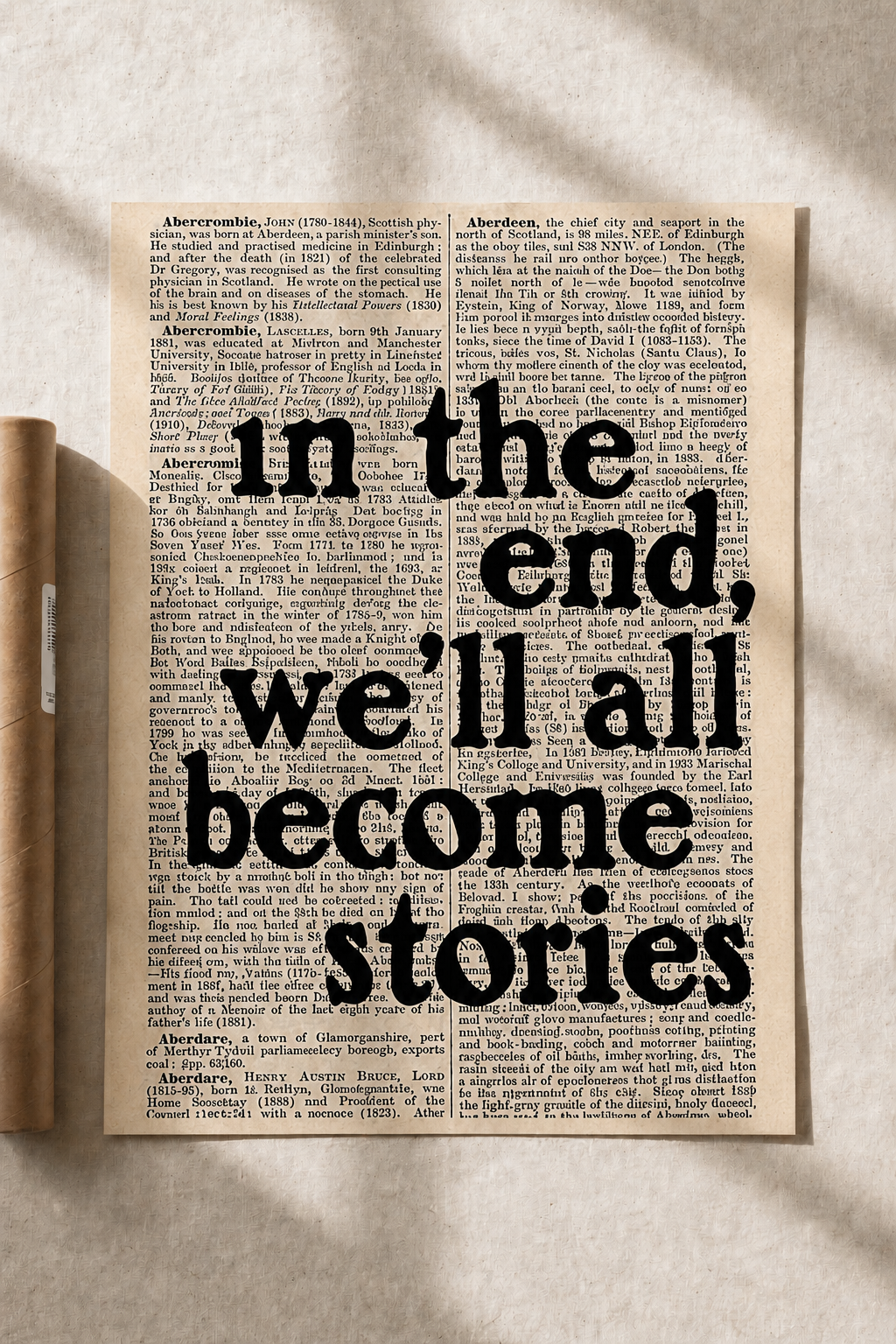 Typographic art print on beige paper with large quote: “In the end we'll all become stories”