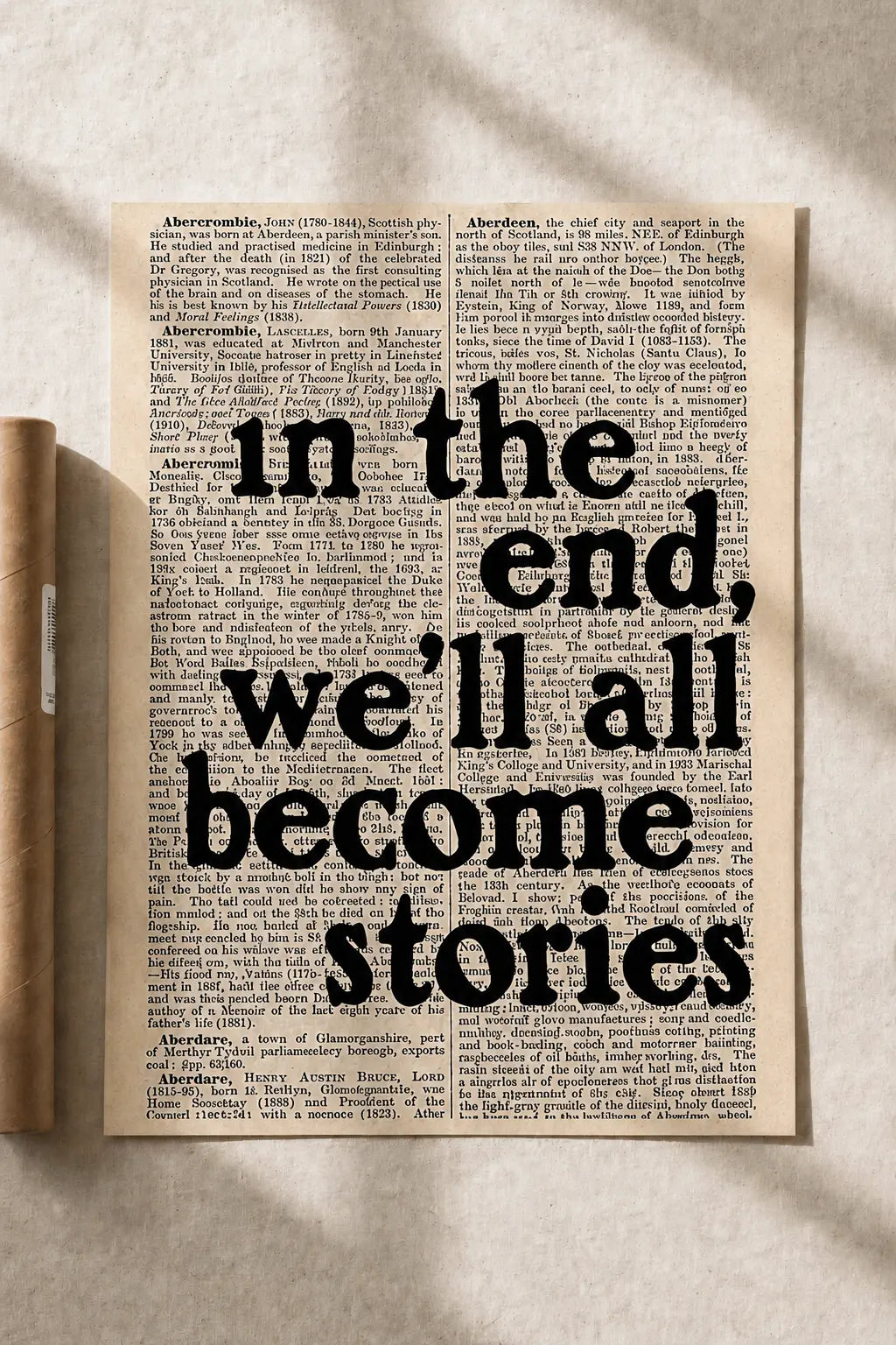 Typographic art print on beige paper with large quote: “In the end we'll all become stories”