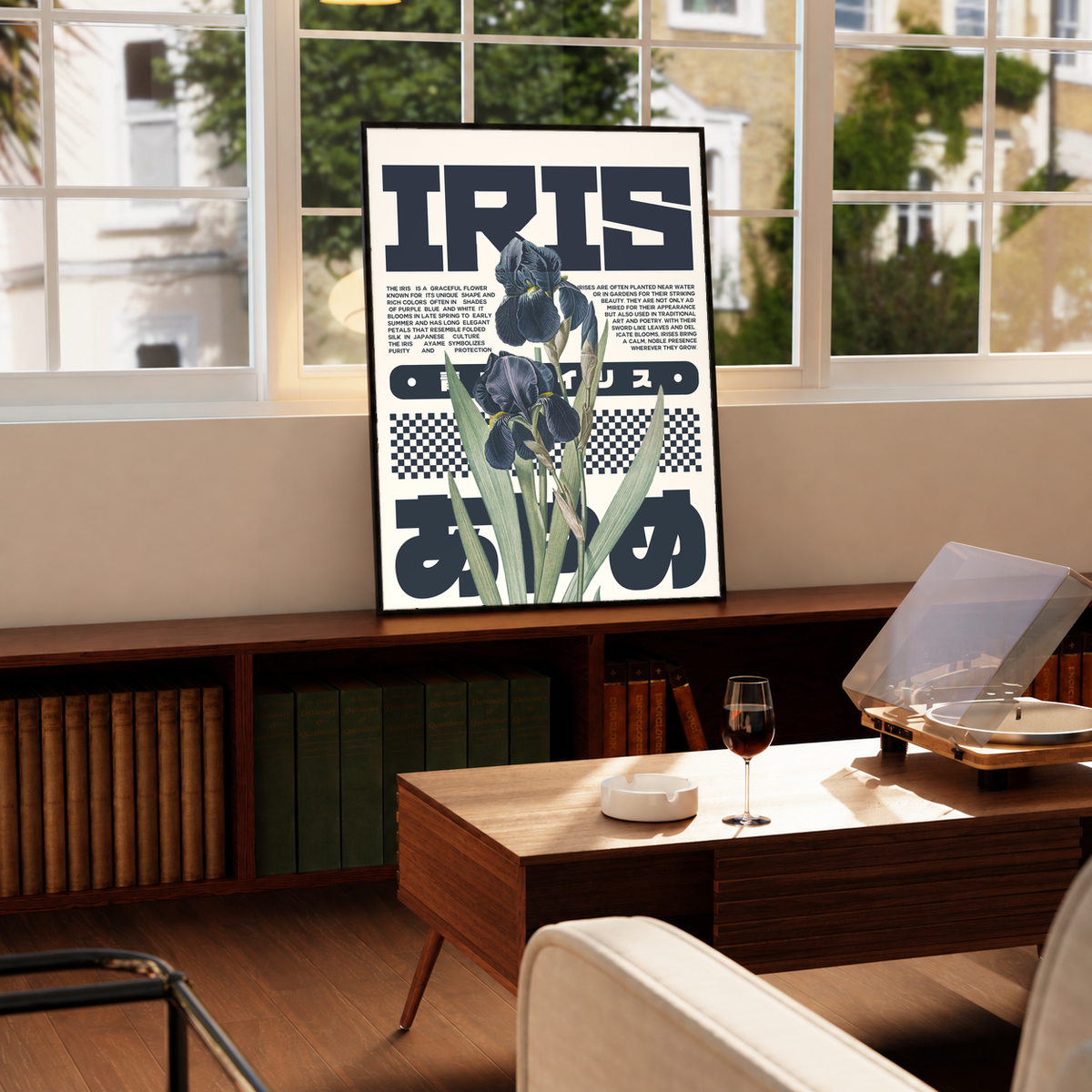Botanical typography poster with iris flowers and bold IRIS lettering on a wooden surface