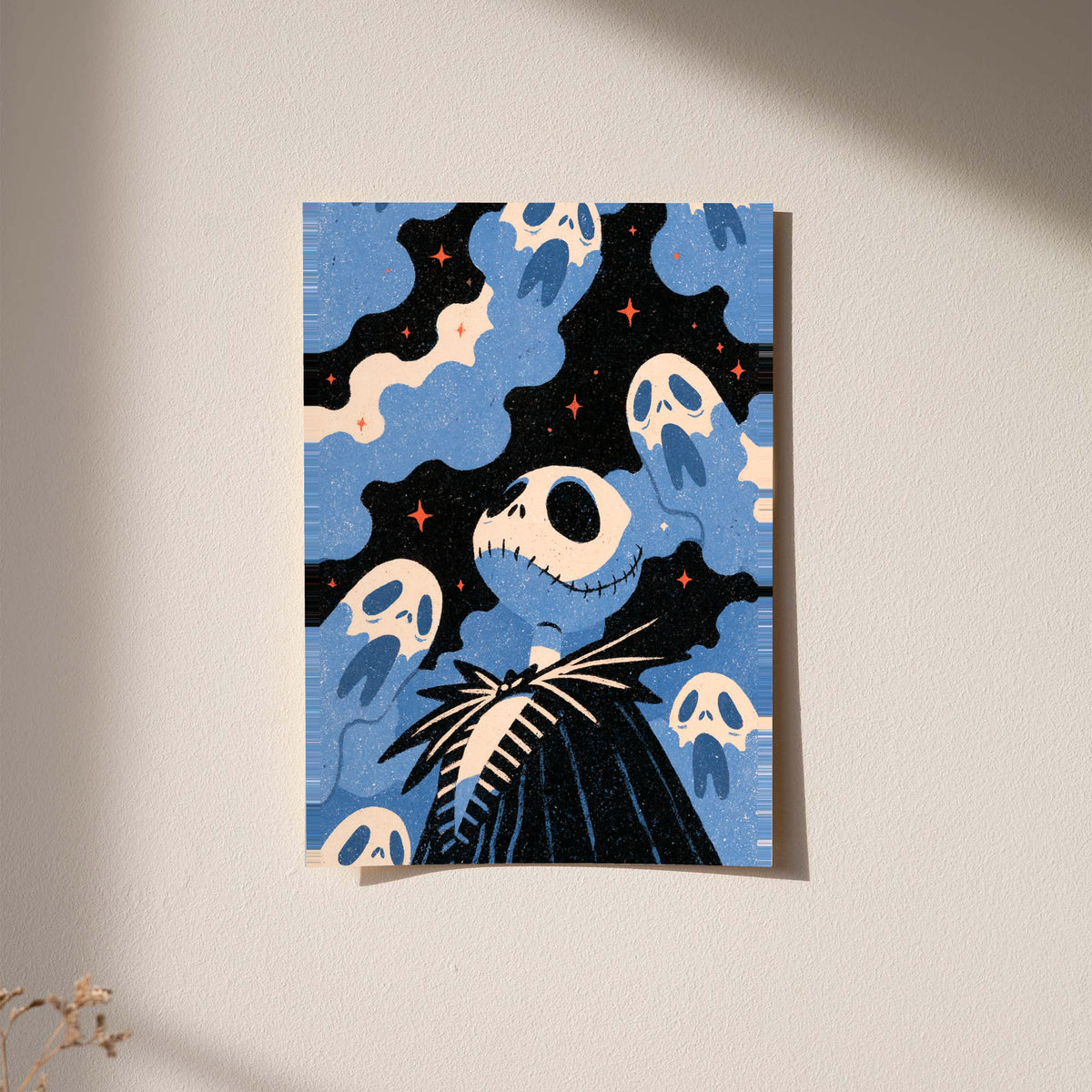Jack Skellington surrounded by blue ghosts, cream clouds and tiny orange stars on black displayed without a visible frame on a softly lit pale wall
