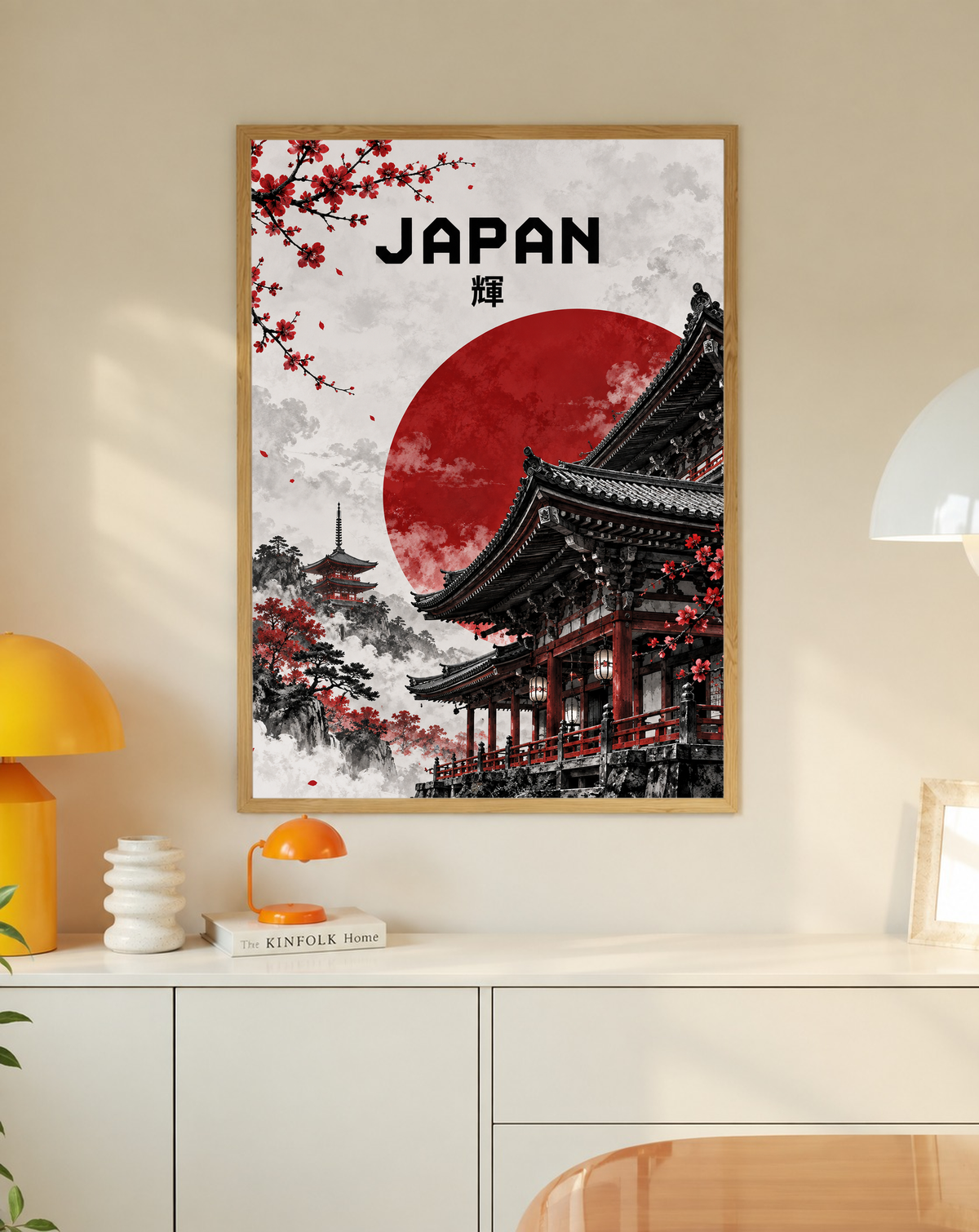 Framed temple poster with red sun, black temple, cherry blossoms, and bold JAPAN lettering.
