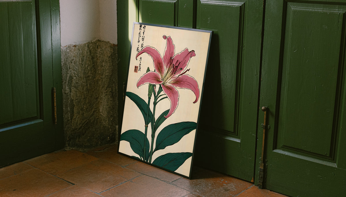 Pink lily with dark green leaves Japanese calligraphy and a red seal on cream as an unframed print leaning against a green panelled door