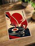 Framed vinyl record cat art print on a wooden table; red turntable and figures