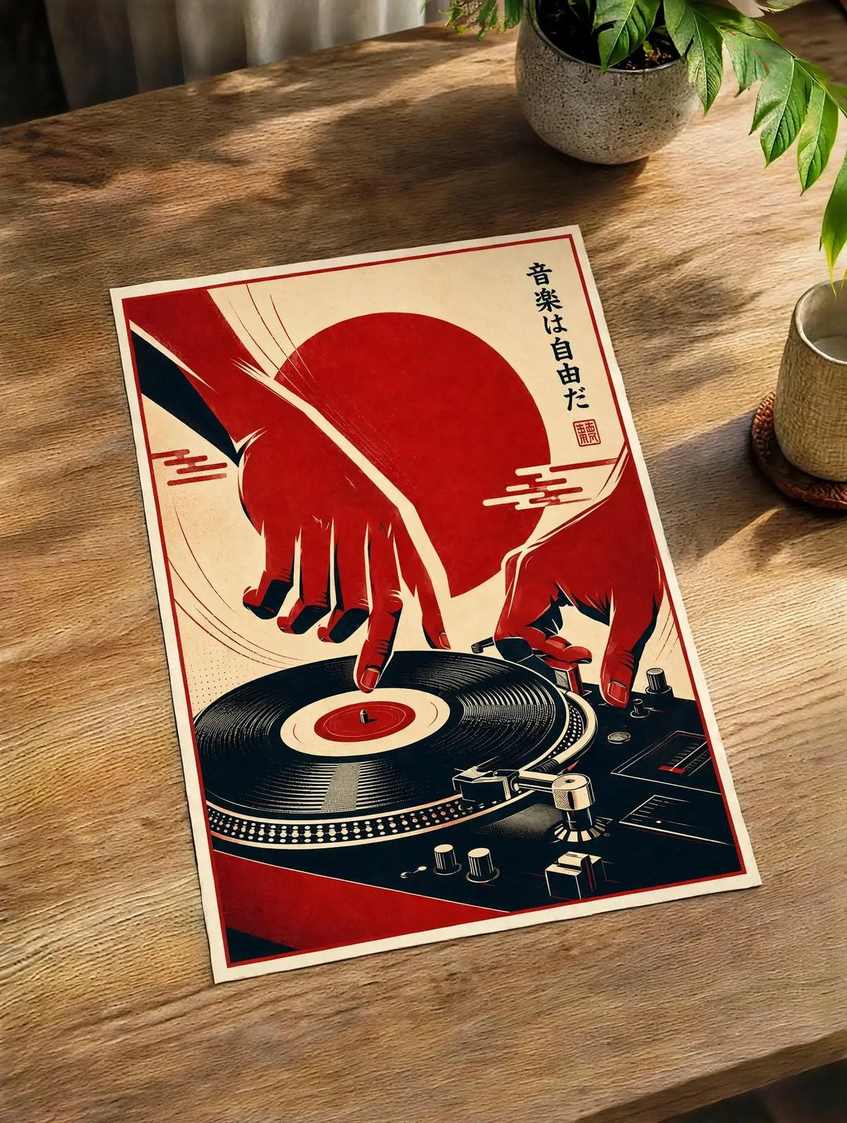 Framed vinyl record cat art print on a wooden table; red turntable and figures