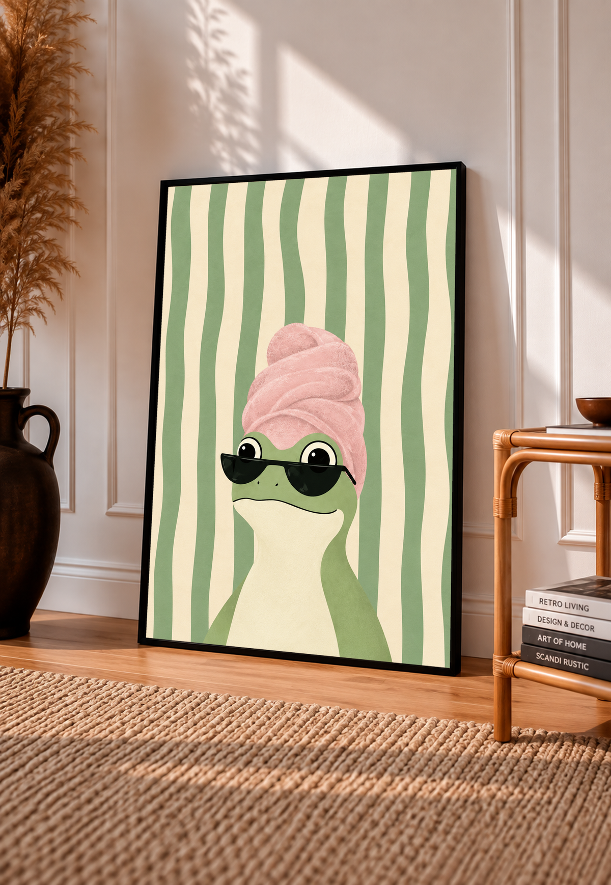 Framed frog art print with a pink towel turban and black sunglasses on striped background
