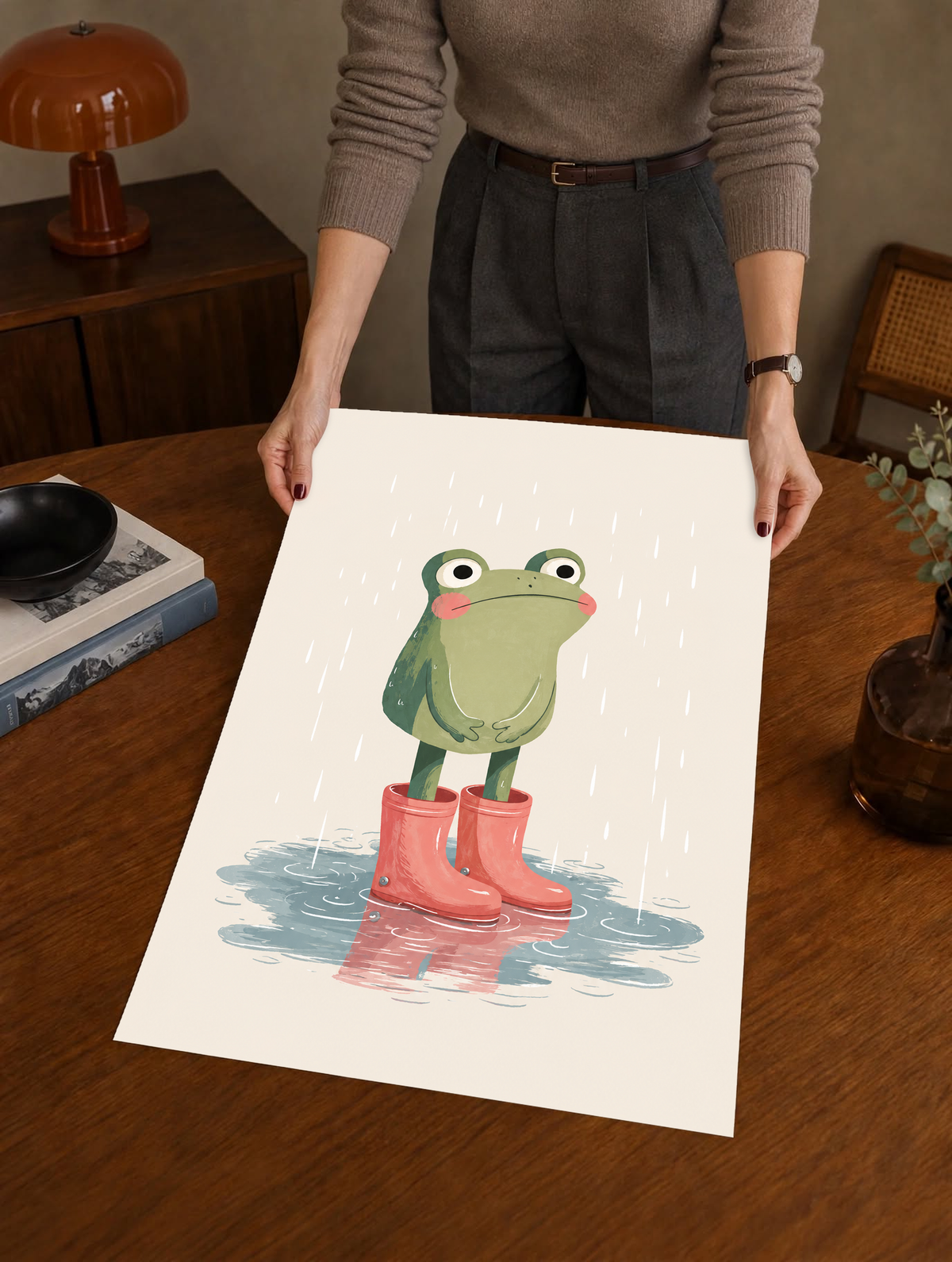 Frog in red boots art print on paper, shown at an angle