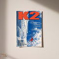 K2 mountaineering poster with red climber on a blue glacier wall