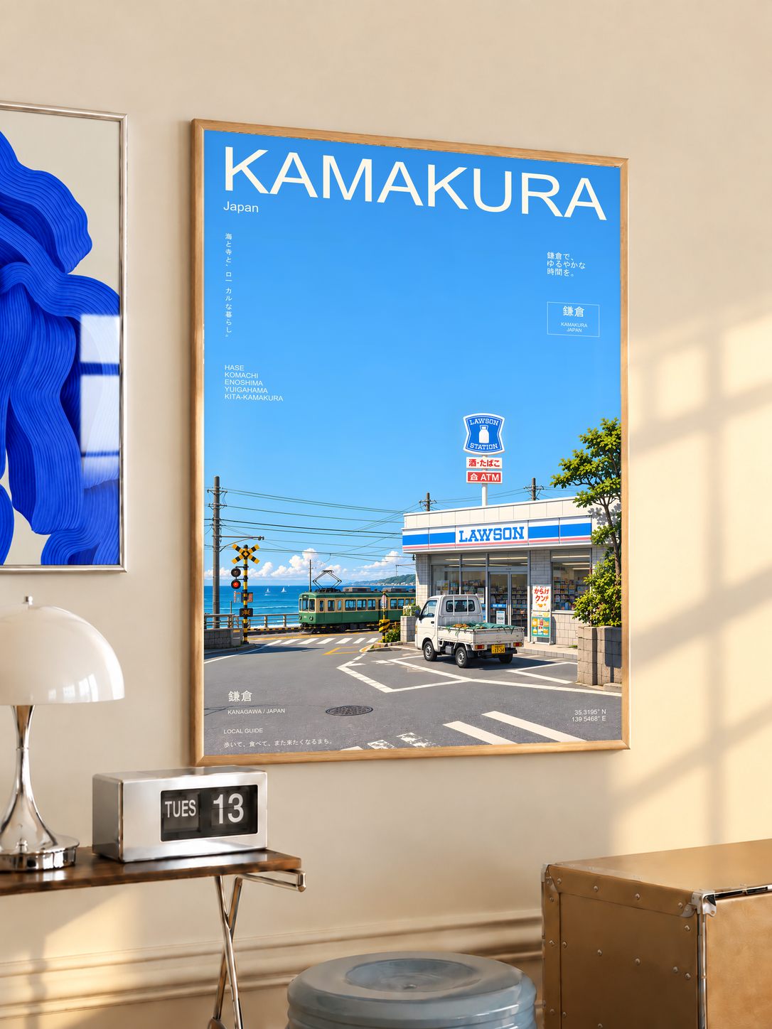 Lawson convenience store and railway crossing under a blue Kamakura sky; oak framed print in a desk setting
