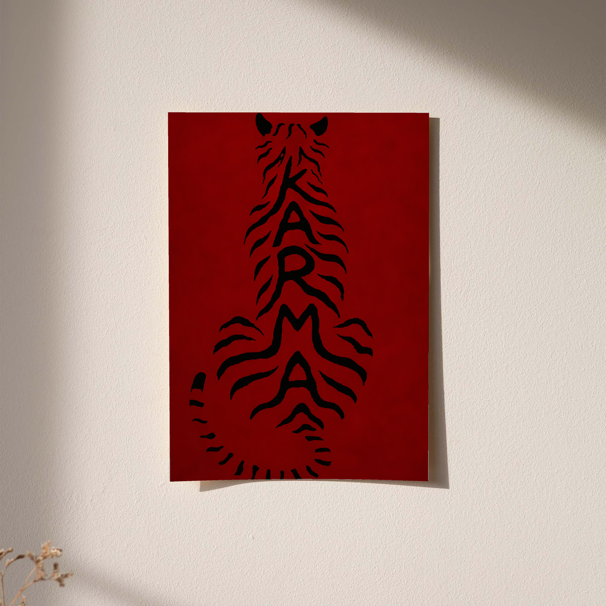 Black feline typography on deep red poster, vertical design.