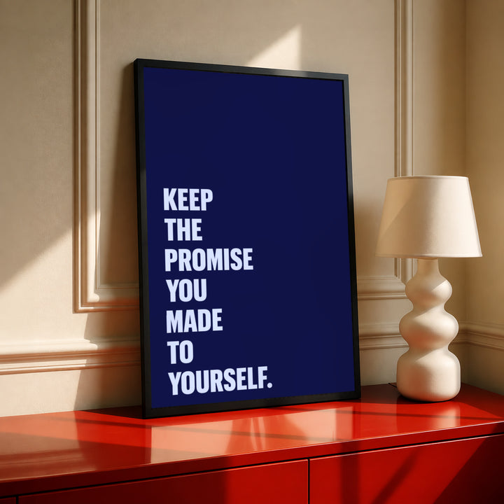Standing framed motivational poster with navy background and pale blue “KEEP THE PROMISE…” text.
