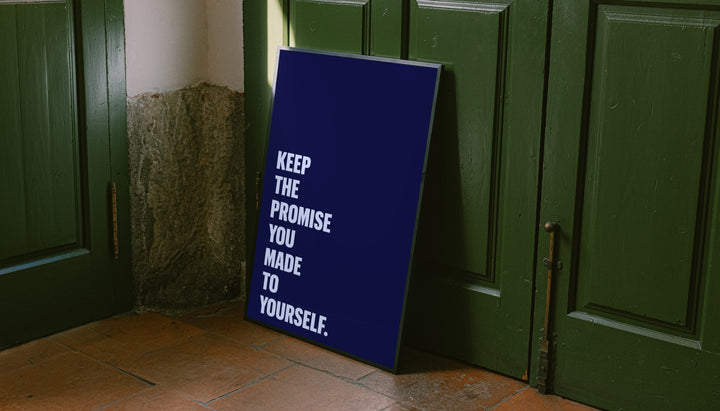 Leaning motivational poster with navy background and pale blue “KEEP THE PROMISE…” typography.