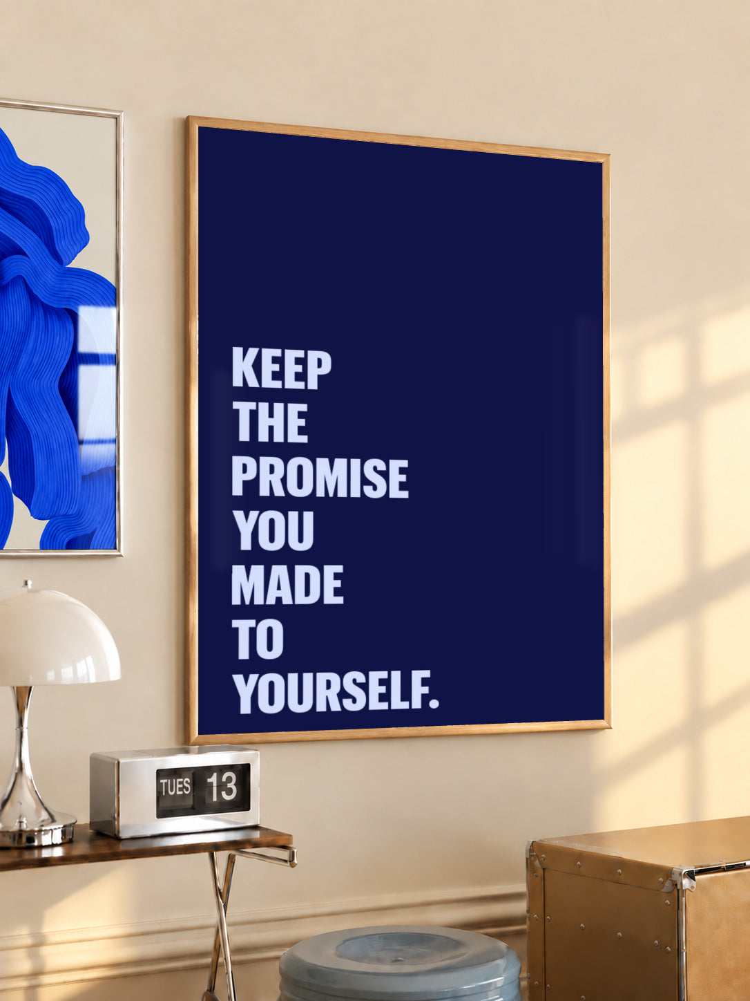 Framed motivational poster with navy background and pale blue “KEEP THE PROMISE…” text.