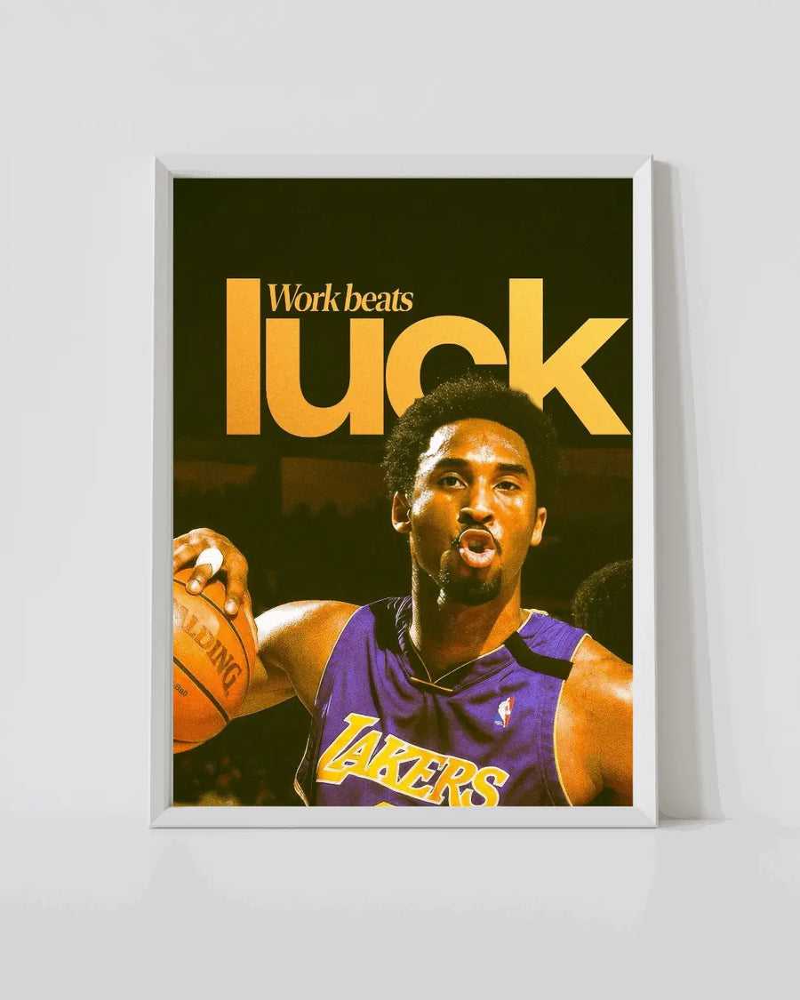 Framed basketball poster of Kobe Bryant in purple Lakers jersey with bold “Work beats luck” text