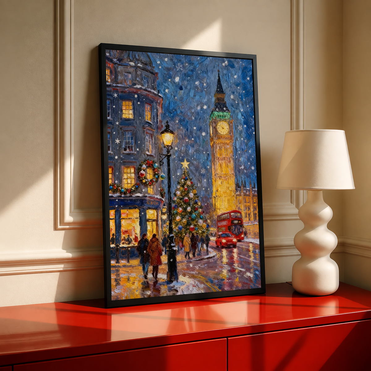 Black-framed canvas print of snowy London street with glowing Big Ben and red bus.