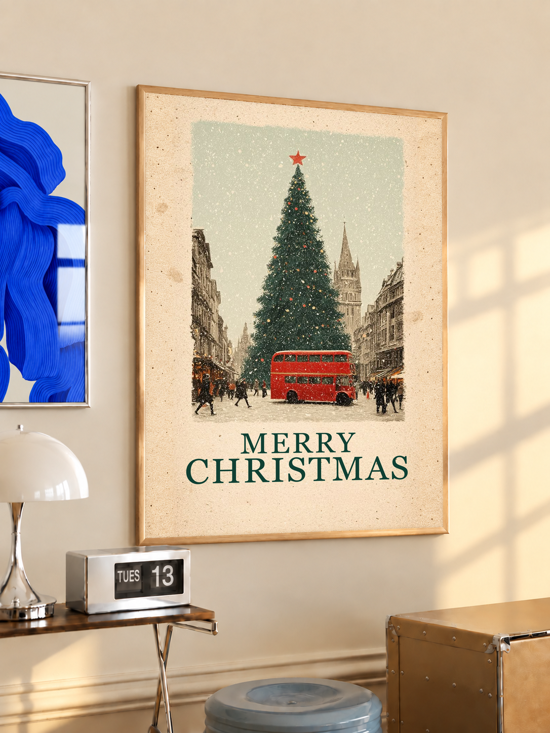 Wood-framed Christmas poster with red bus, pine tree, and “MERRY CHRISTMAS” lettering