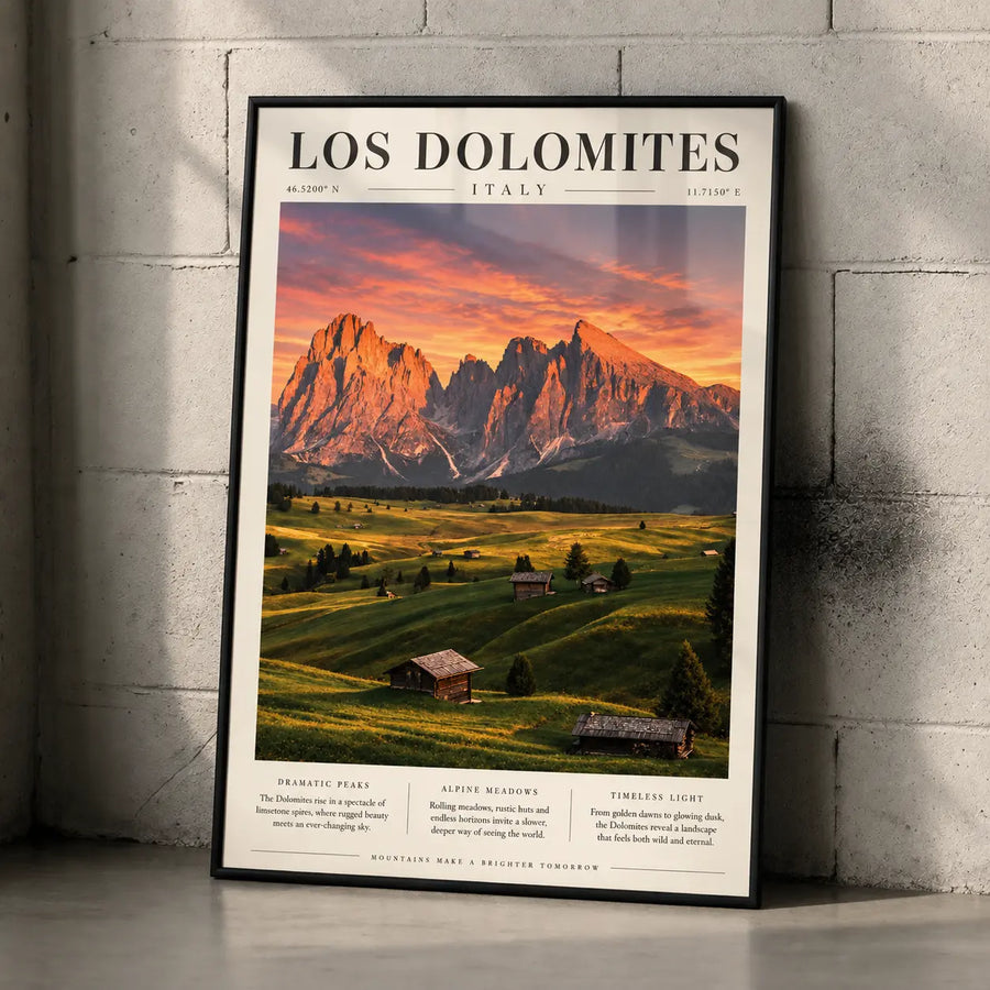 Dolomites Sunset Art Print displayed in a black frame with golden mountain peaks and rolling green alpine valleys