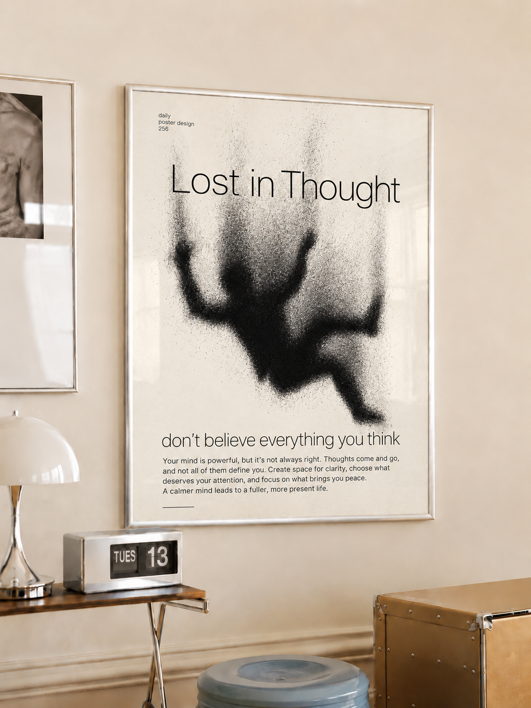 Framed typography wall art poster with “Lost in Thought” and abstract handprint silhouette