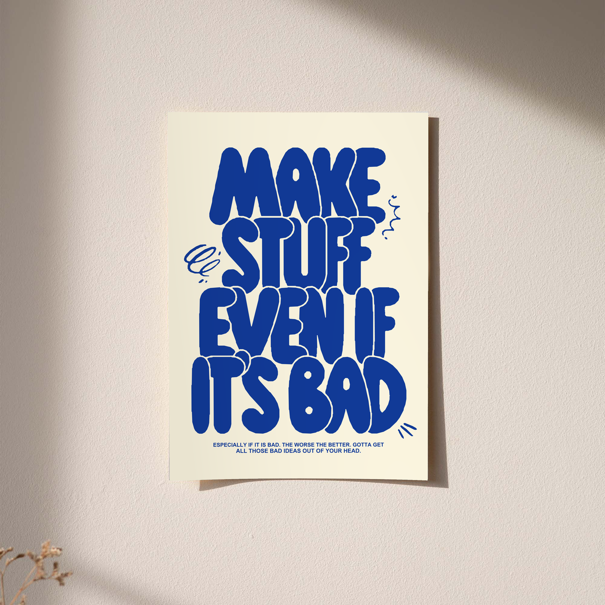 Cream unframed poster with bold blue “MAKE STUFF EVEN IF IT'S BAD” lettering.