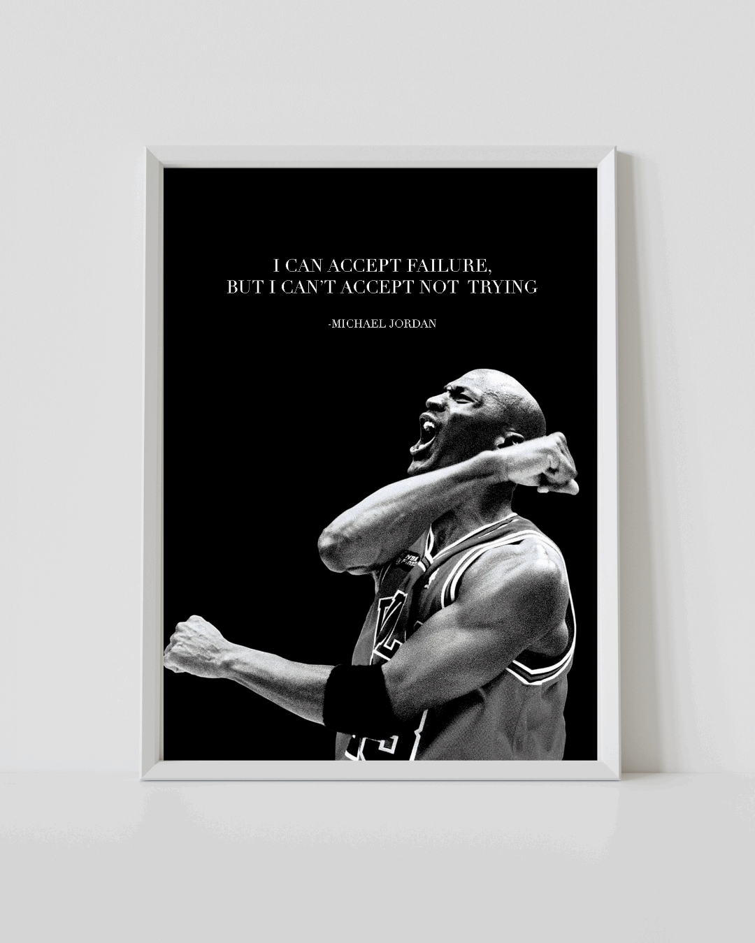 White-framed basketball quote poster with Michael Jordan portrait and inspirational text