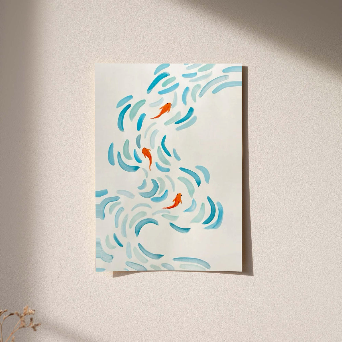 Small orange koi swimming among curved aqua and blue brushstrokes on cream displayed without a visible frame on a softly lit pale wall