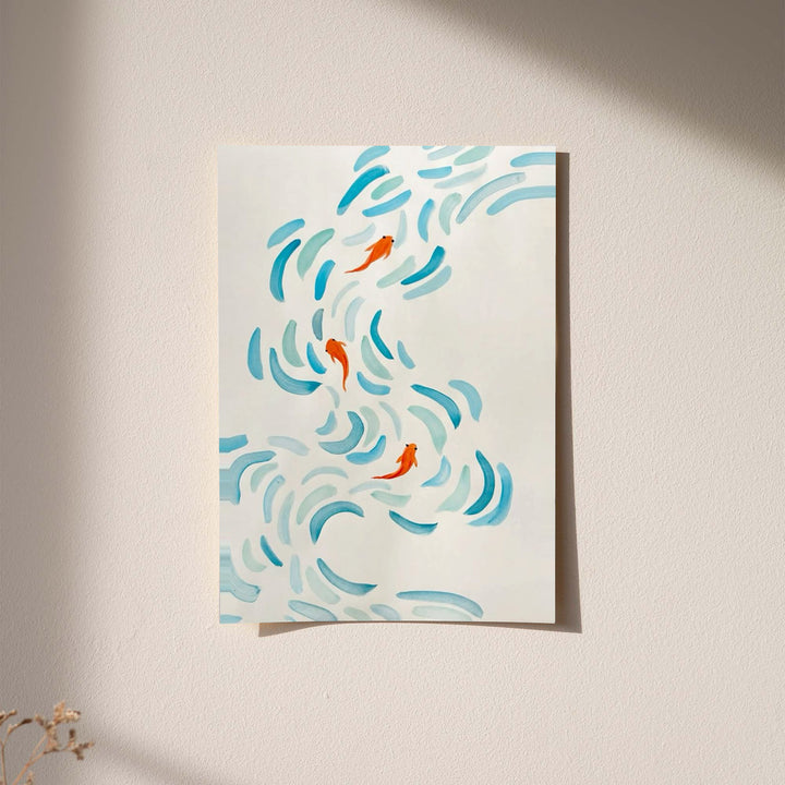 Small orange koi swimming among curved aqua and blue brushstrokes on cream displayed without a visible frame on a softly lit pale wall