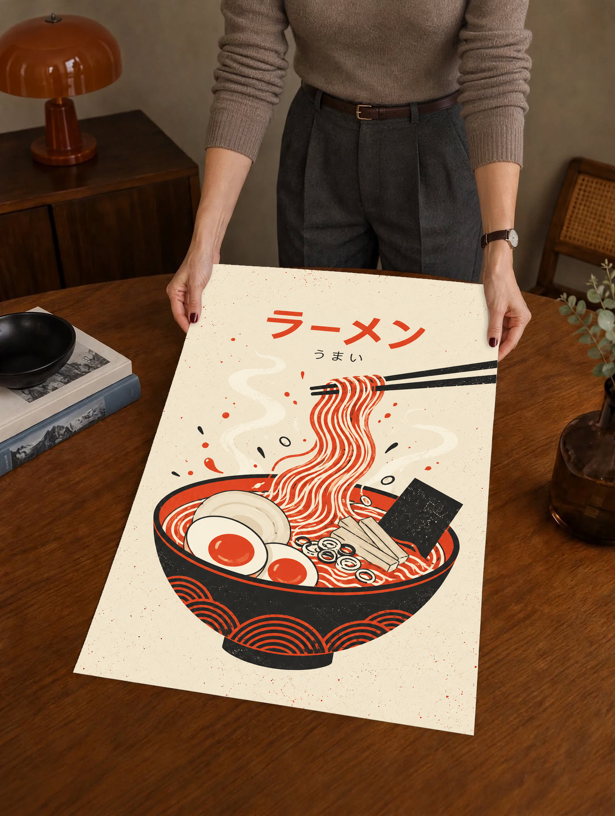 Ramen poster with red and black noodle bowl, egg, and chopsticks, held flat