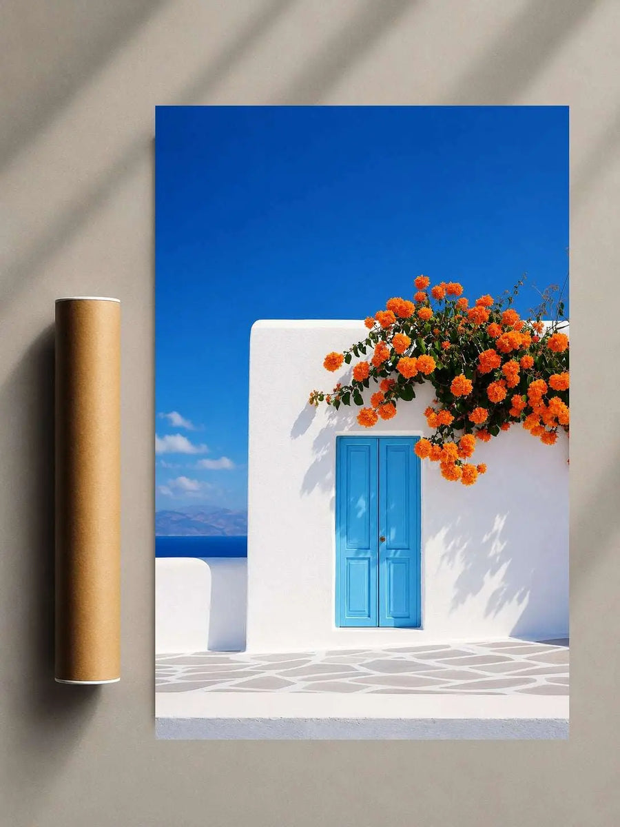 Blue door wall art print with orange flower garland on white facade