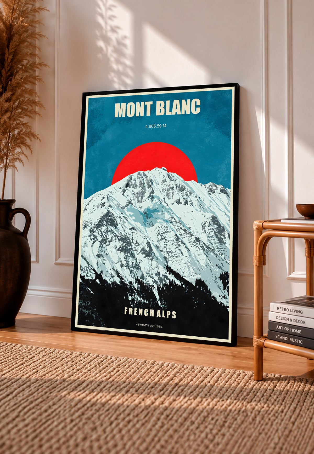 Black-framed Mont Blanc poster with snowy mountain artwork and red sun