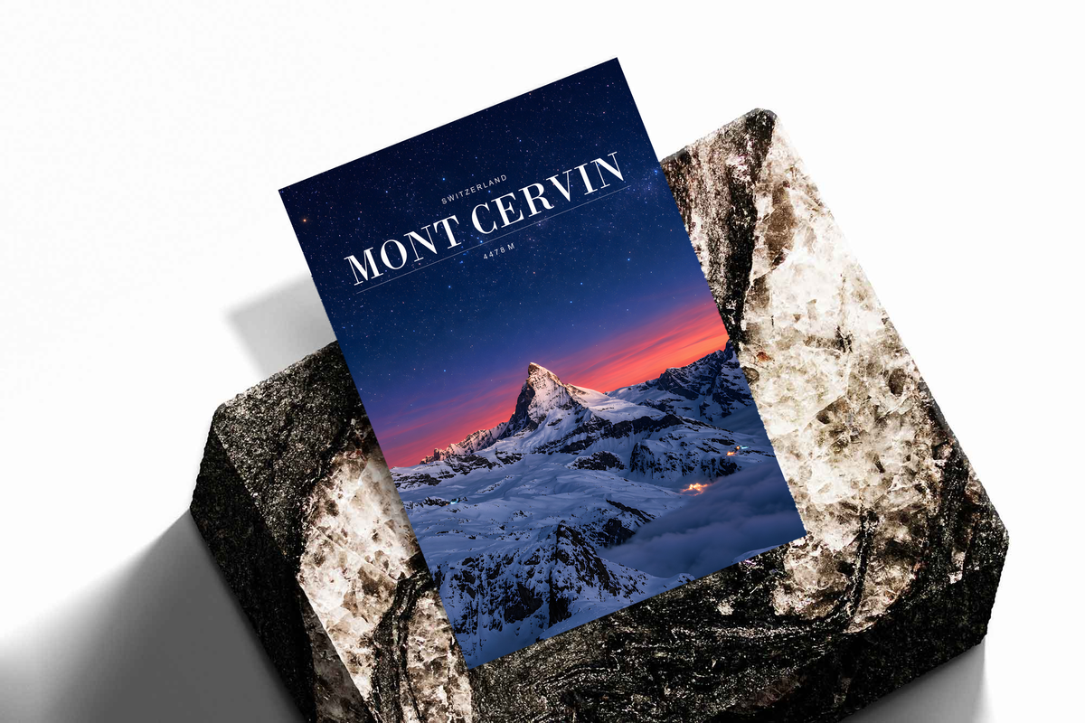 Snowy Mont Cervin beneath a starry navy sky and pink horizon; unframed print on a stone display