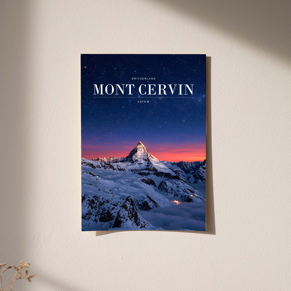 Snowy Mont Cervin beneath a starry navy sky and pink horizon; unframed print on a wall