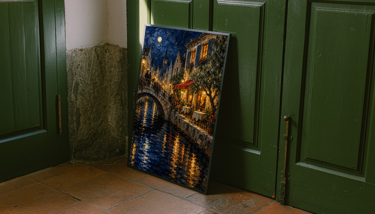 Black-framed night canal bridge print leaning by green doors, with glowing windows and water