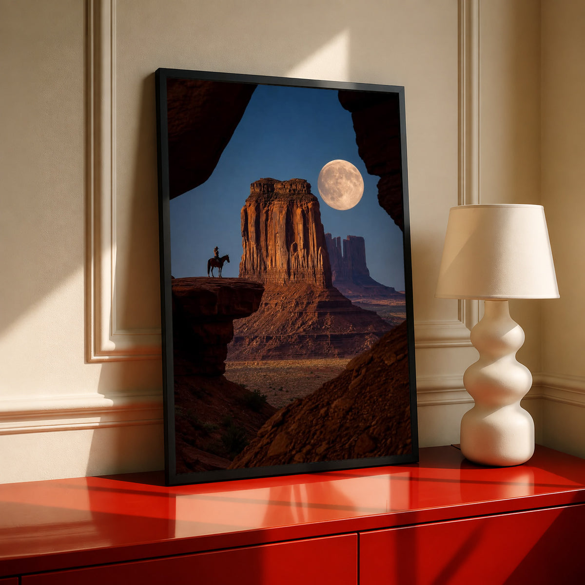Black framed cowboy on horseback silhouette with full moon over sandstone butte desert wall art