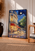 Framed French café print with black frame, moonlit street and red awnings