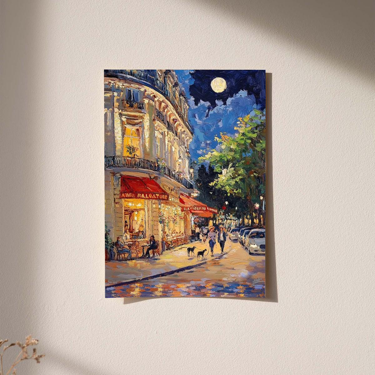 Framed moonlit street print on wall with full moon and vibrant building details