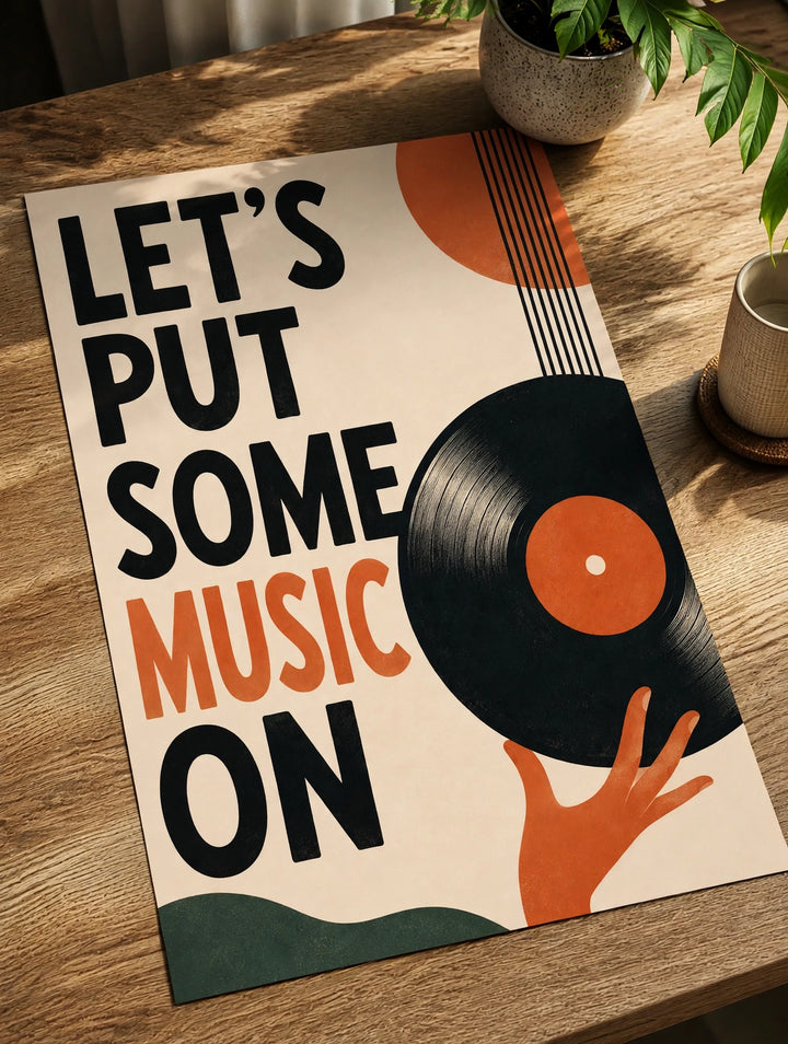 Music-themed paper poster on tabletop, with vinyl record and "LET'S PUT SOME MUSIC ON"