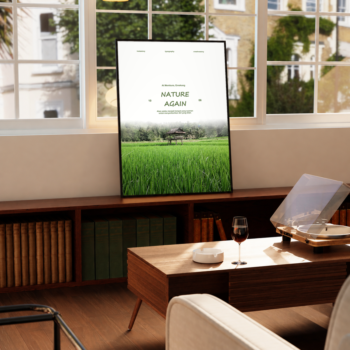 Green rice field and small wooden pavilion beneath Nature Again lettering; framed print beside a window
