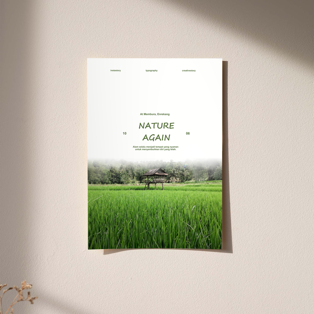 Green rice field and small wooden pavilion beneath Nature Again lettering; unframed print on a wall