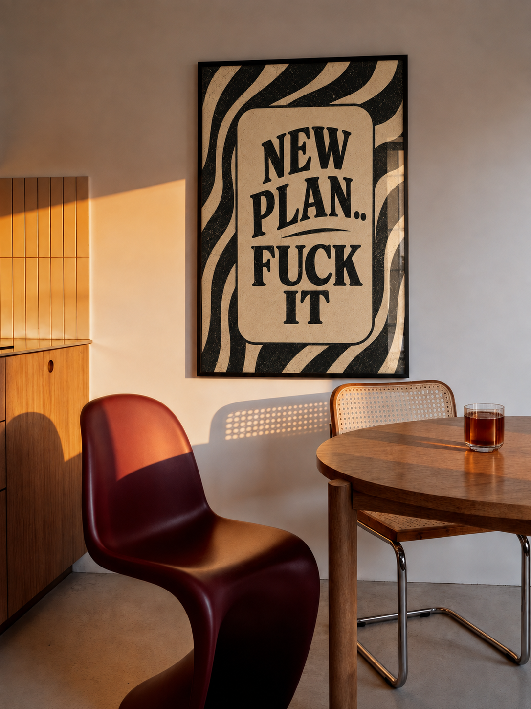 Framed typography wall art with cream text box reading "NEW PLAN... FUCK IT", black frame