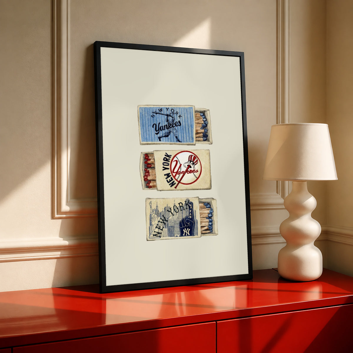 Black-framed baseball matchbox print with vintage Yankees collage on cream