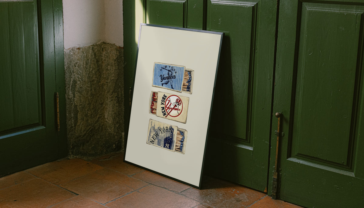 White-framed baseball matchbox print with vintage Yankees collage on cream
