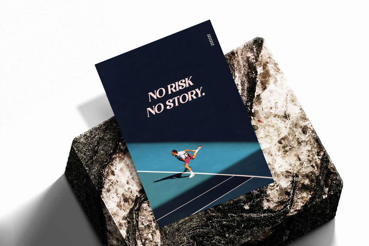No Risk No Story quote in pale pink above a tennis player on a turquoise court with a diagonal shadow, shown as an unframed print tilted on a dark stone display against a light background